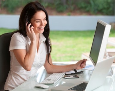 Lady giving a moing quote on the phone