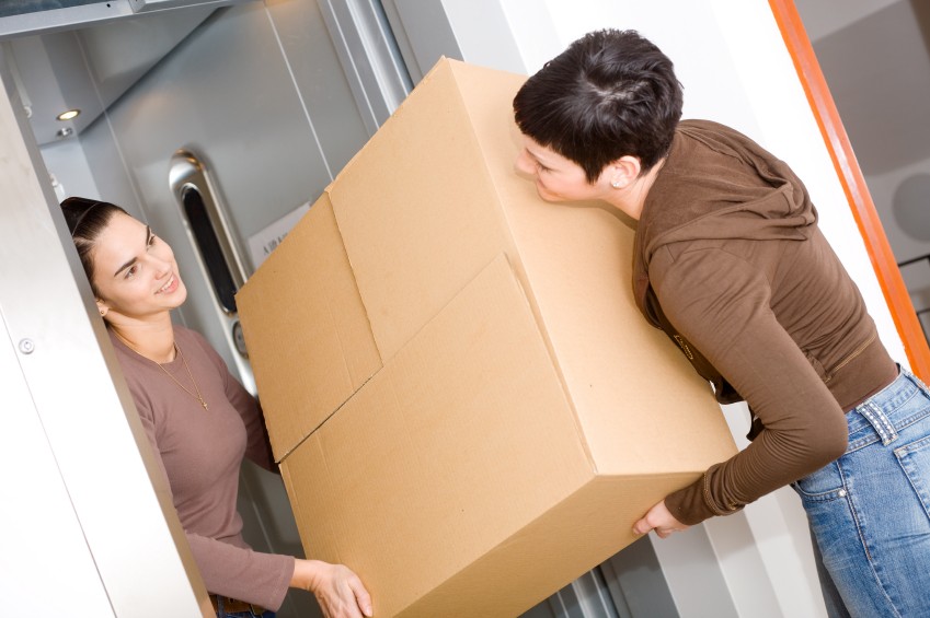 Two women with a box